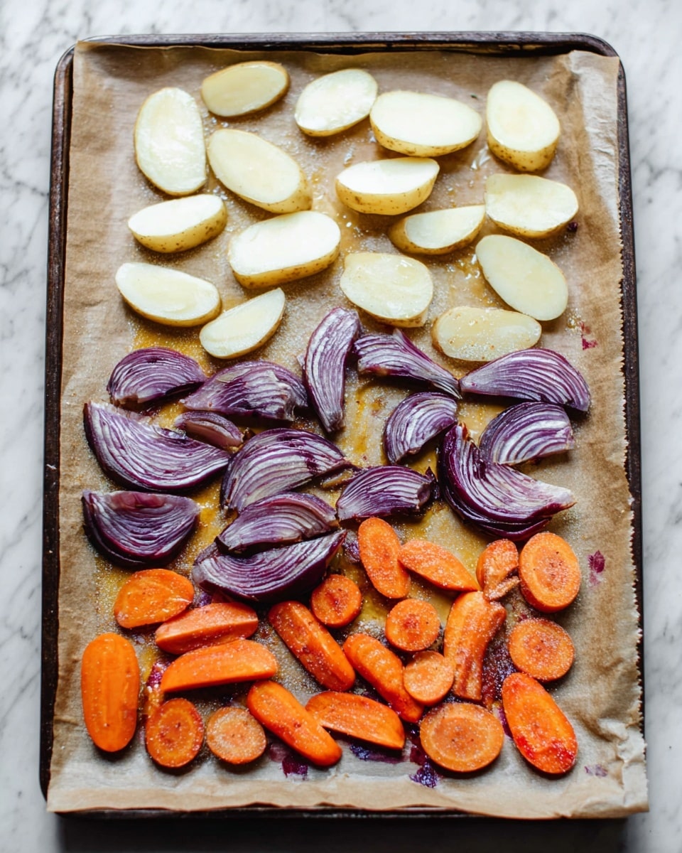 The image shows a baking tray covered with brown parchment paper on a white marbled surface. The tray holds three groups of vegetables arranged in layers: at the top, pale yellow potato slices with soft, smooth texture, some cut into wedges; in the middle, curved layers of purple and white sliced red onions showing clear rings; and at the bottom, bright orange carrot slices mixed with some deep purple carrot slices, all glistening with oil. The vegetables are spread loosely but neatly across the tray. Photo taken with an iphone --ar 4:5 --v 7