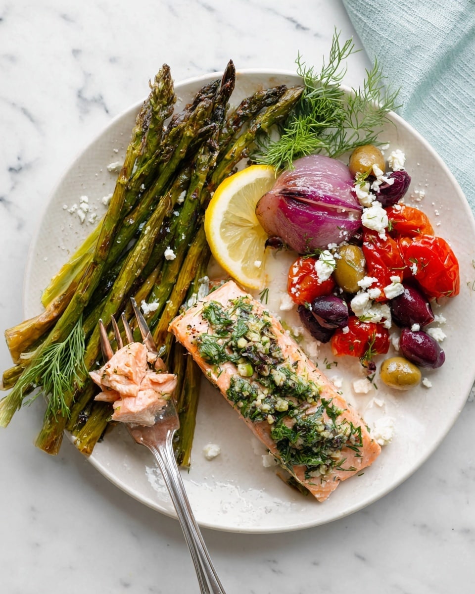 A white plate on a white marbled surface holds a meal with three main parts: a rectangular piece of cooked salmon topped with finely chopped green herbs, a lemon wedge and sprigs of fresh dill placed beside it; a bunch of grilled green asparagus spears scattered with crumbled white cheese and a small green herb sprig on top; and a colorful mix of roasted red cherry tomatoes, purple and green olives, and a few pieces of cooked purple onion, also sprinkled with white cheese. A silver fork rests on the plate, leaning against the salmon with a small portion of salmon on its tines. Photo taken with an iphone --ar 4:5 --v 7